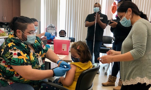 Child gets Covid-19 vaccine